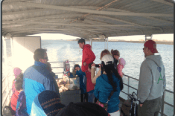 Visitors onboard eco tour