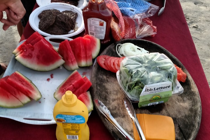 Table full of food on the beach