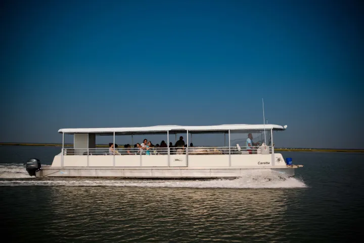 Caretta Cruise boat on the water