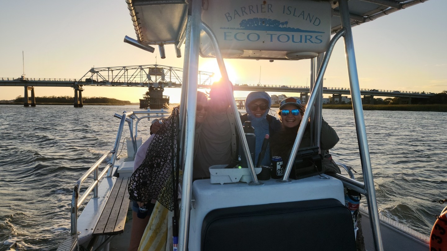 a boat is docked next to a body of water