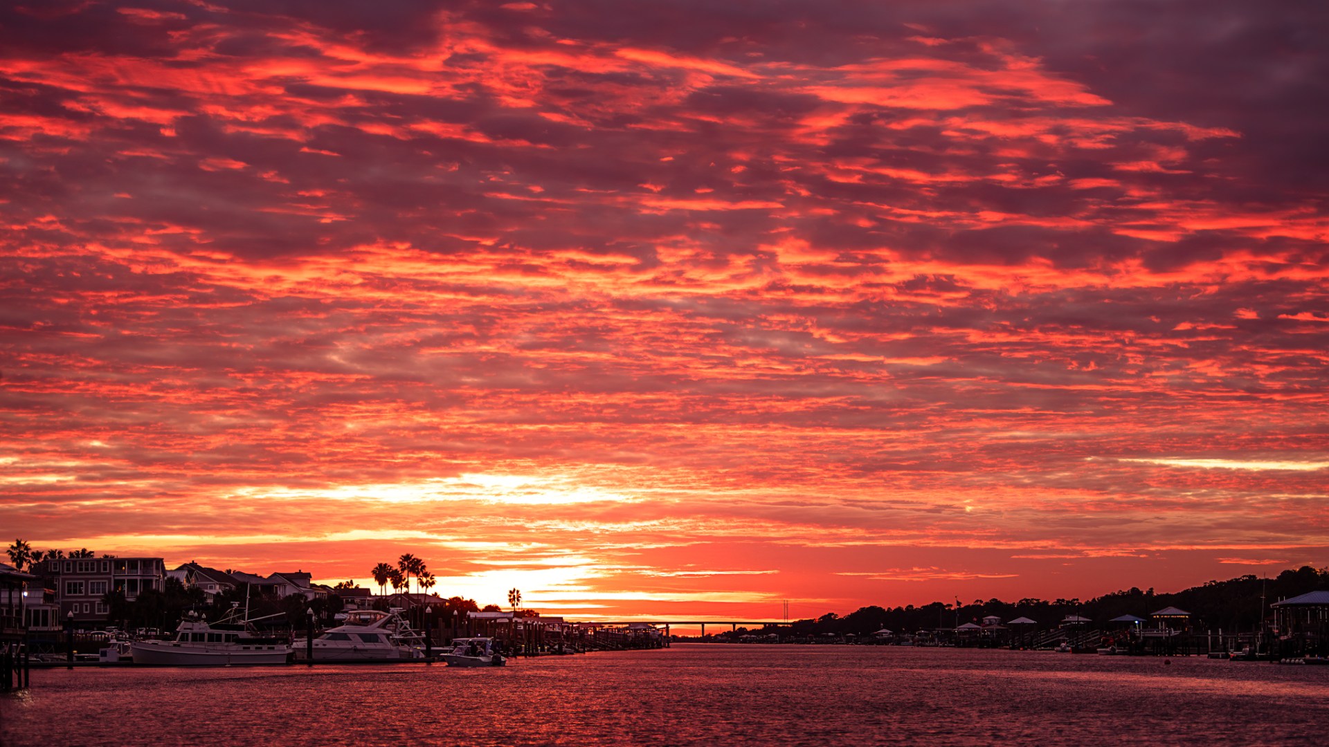 a sunset over a body of water