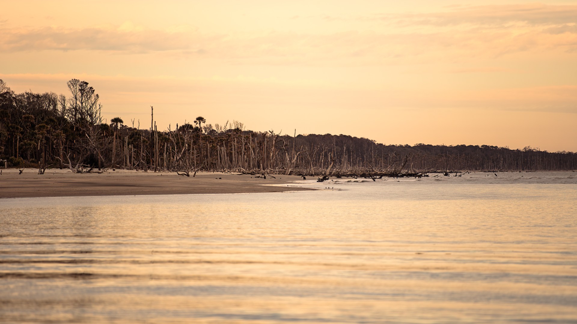 a sunset over a body of water
