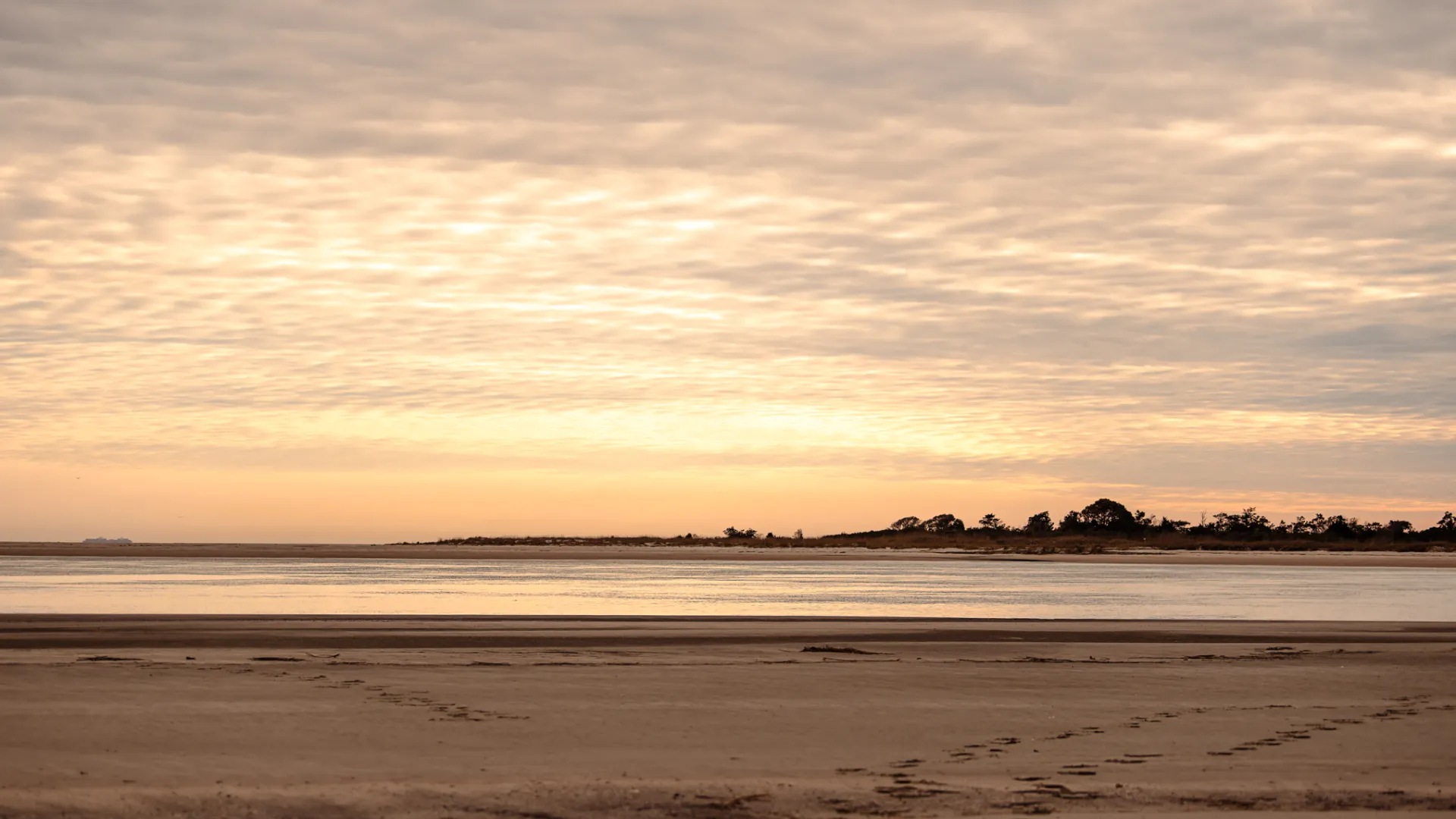 a sunset over a beach