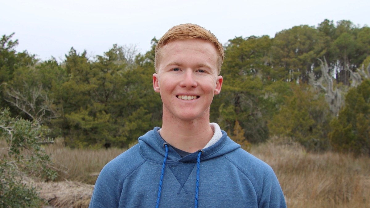 a man smiling for the camera